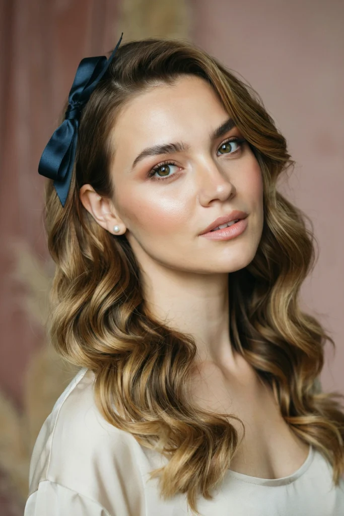 Caramel Balayage Pin-Up Curls With a Side Bow