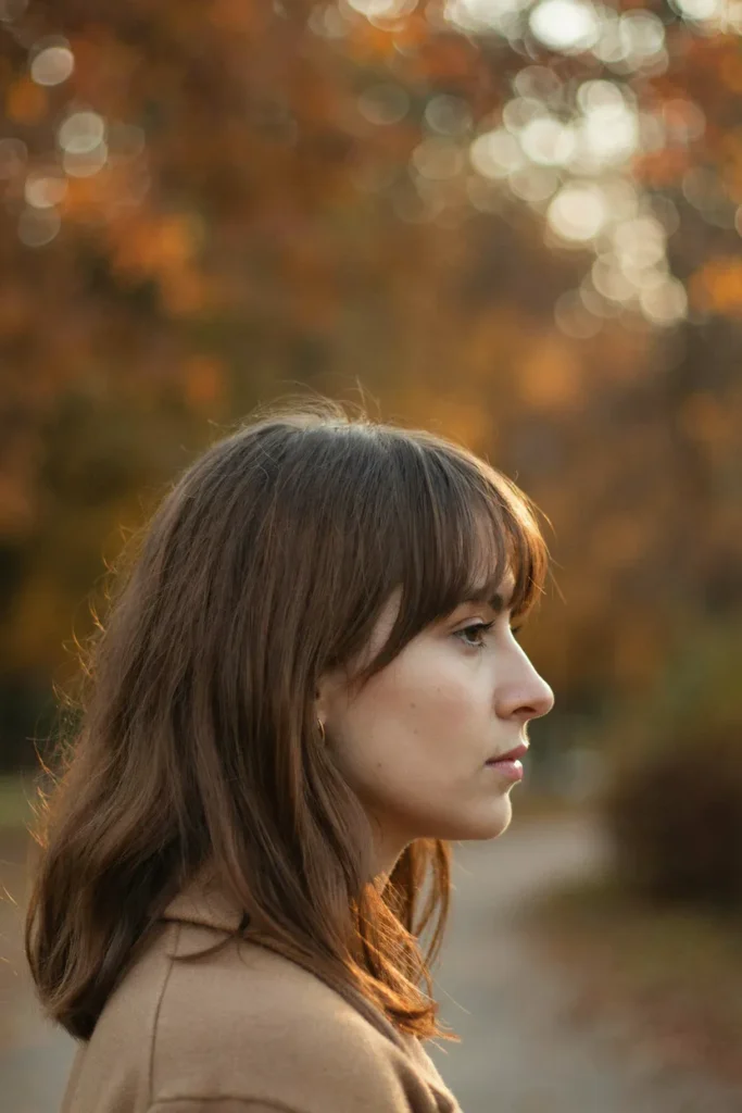 Mocha Brown Hair With Curtain Bangs and Soft Layers
