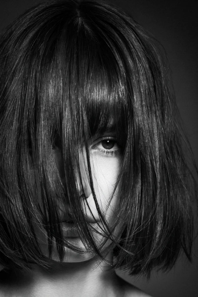 Black Shaggy Bob with Subtle Curtain Fringe